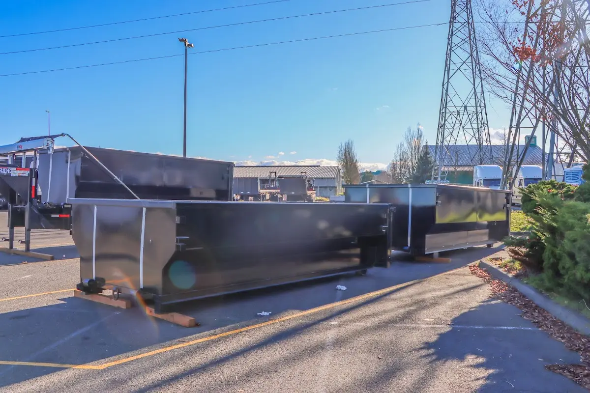 Roll-off dumpster ready for waste disposal at job site for Cleanout Dumpster Rental in University